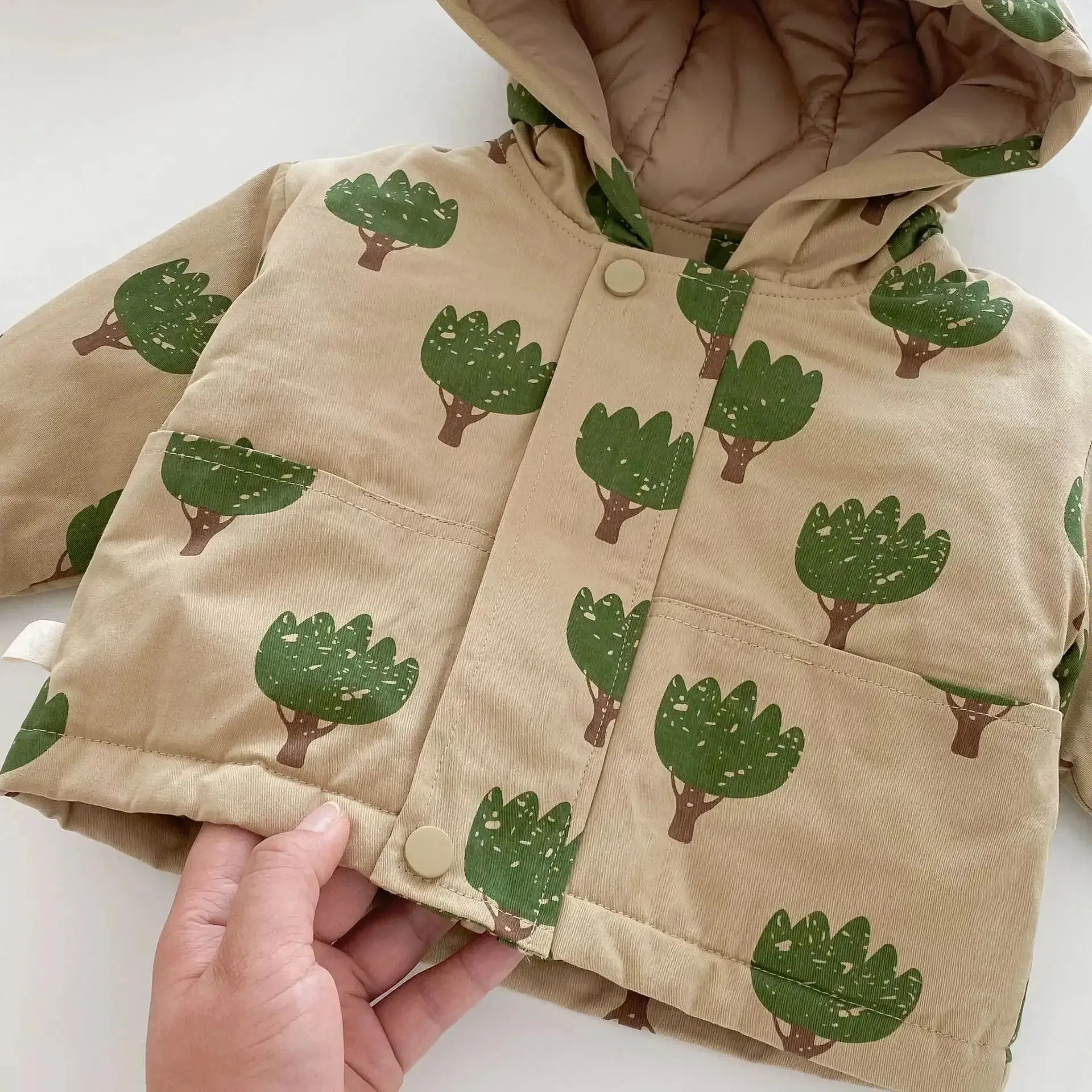 Insulated Winter Jacket with Hood and Tree Print Design